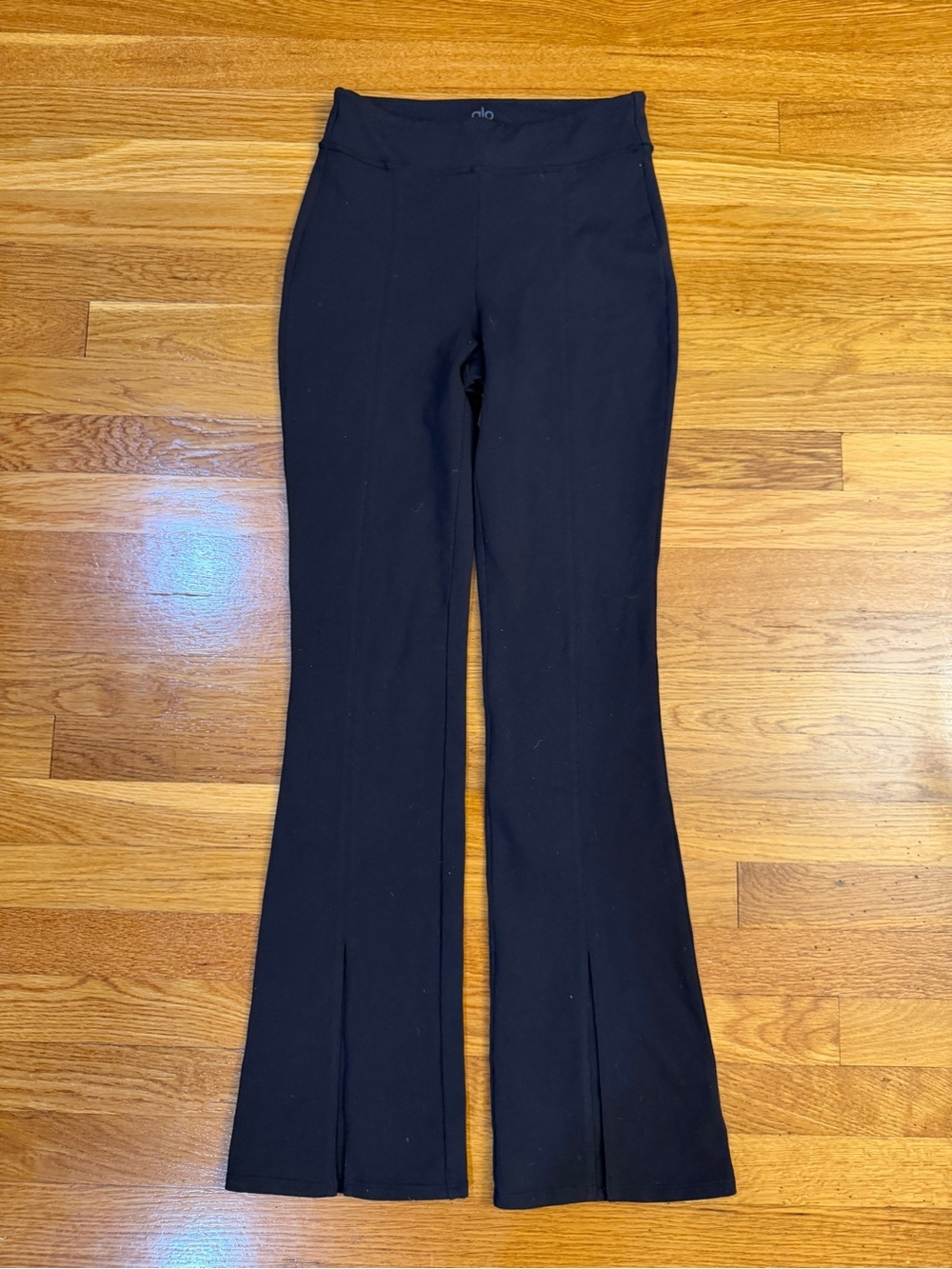Alo Yoga Airbrushed High Waisted Split Hem Flare Legging in Black - Size Small